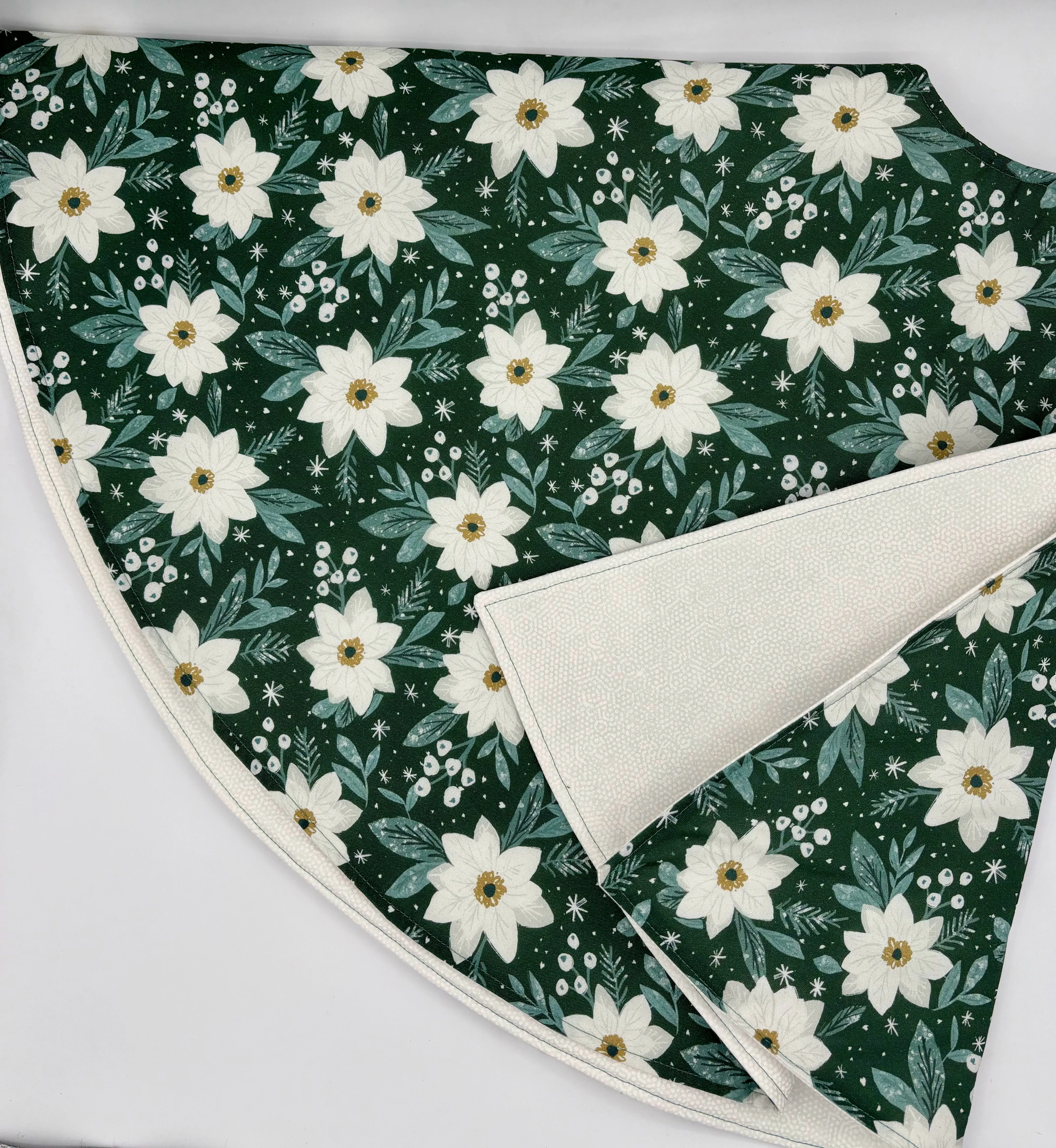 White Floral on Dark Green Tree Skirt